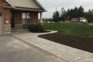 new stone pathway in front of house